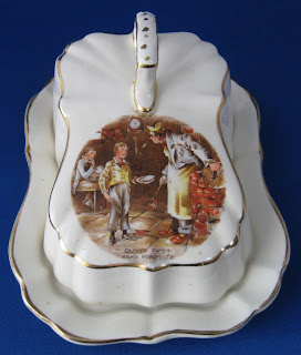 https://timewasantiques.net/products/dickens-ware-oliver-twist-butter-dish-cheese-dome-2-piece-1920s-lancaster?_pos=5&_sid=91cc17960&_ss=r