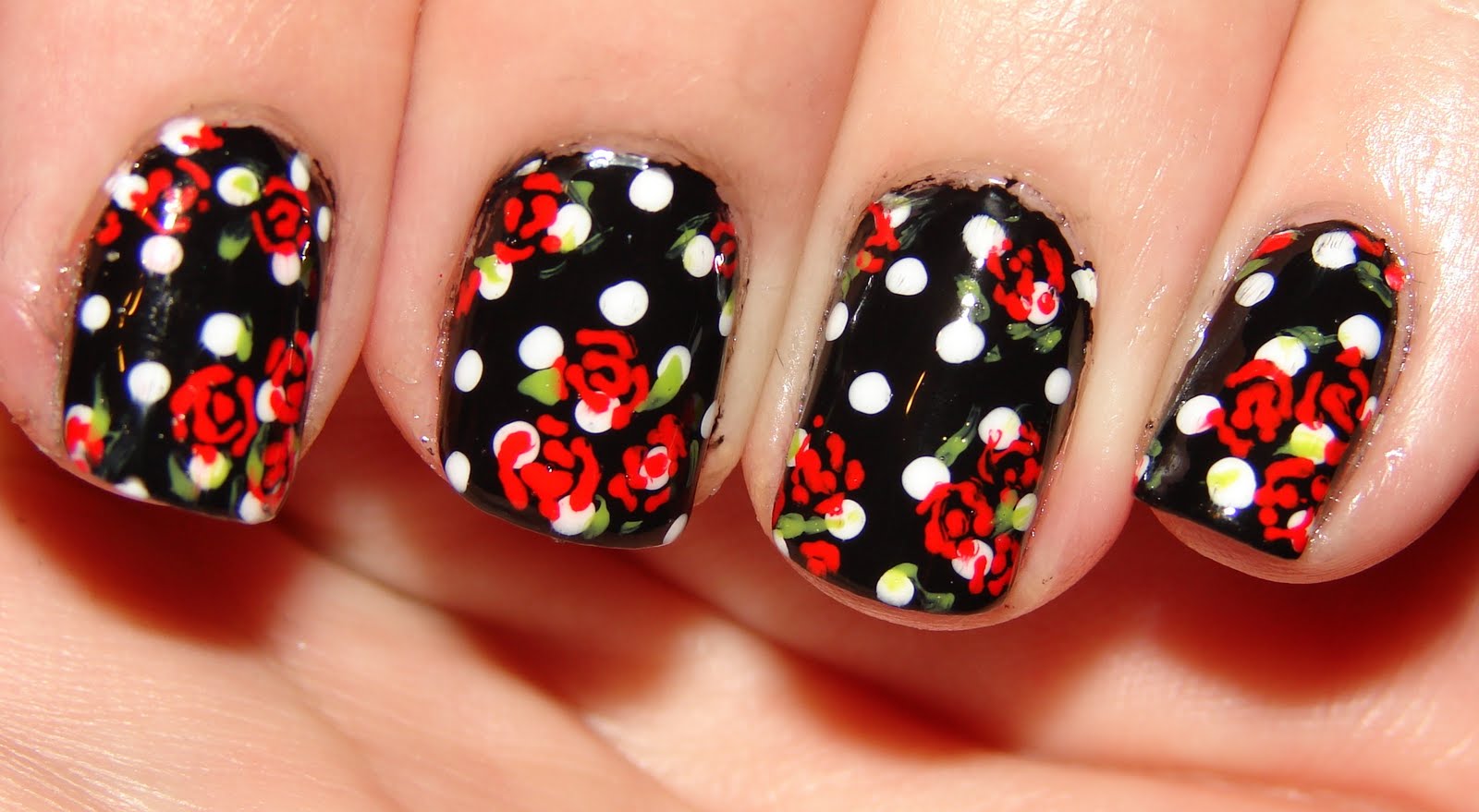 Kawaii Nail Art What's black, white and red all over?