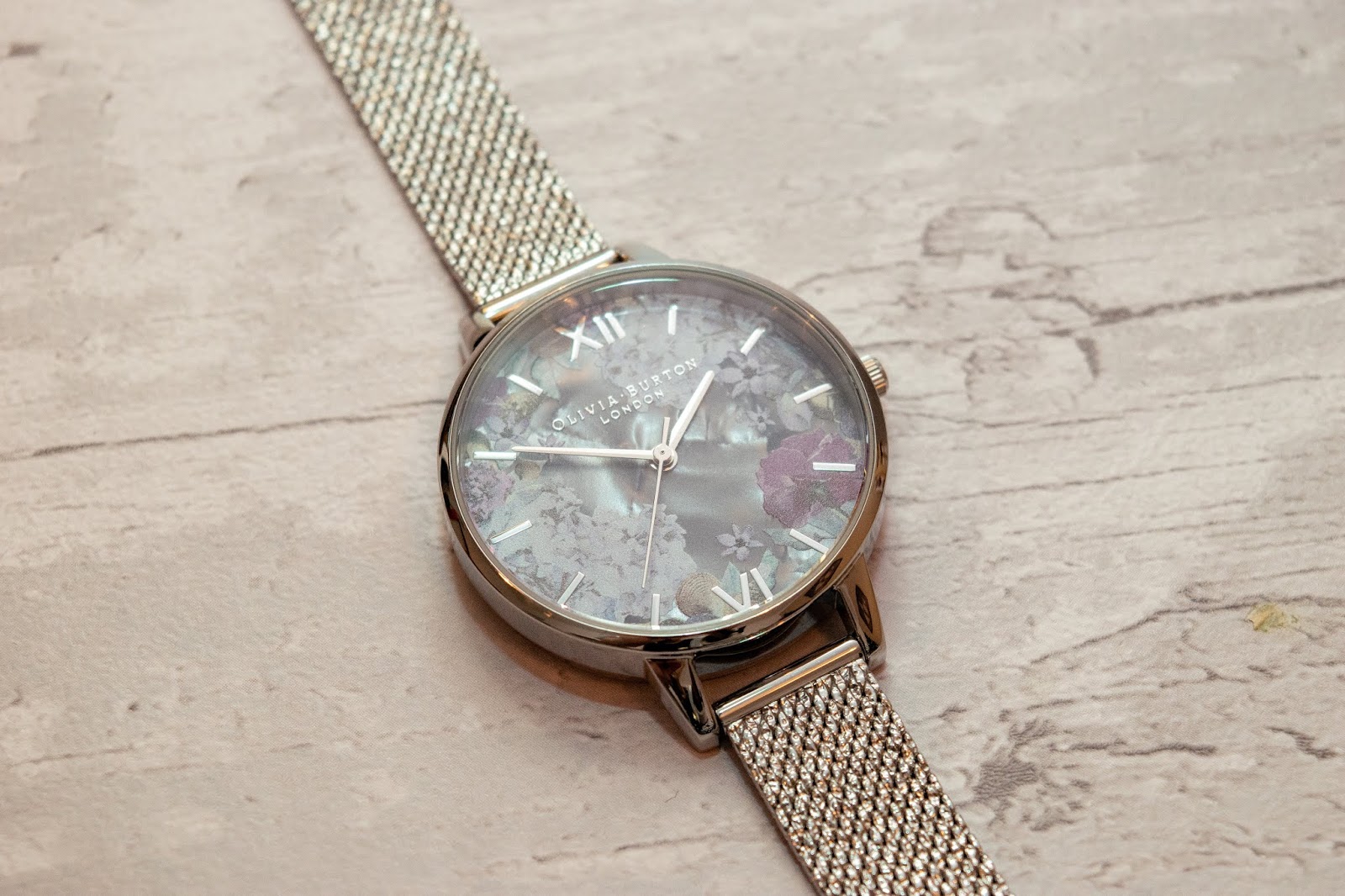 What Cat Says | What I Got For Christmas & My Birthday 2019 An Olivia Burton watch with a purple/lilac floral face and glittery silver strap.