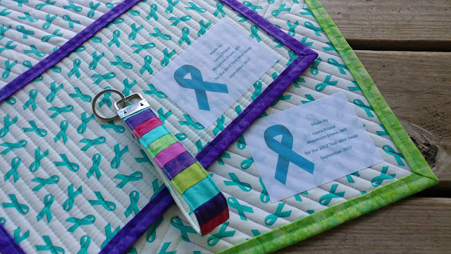 Batiks and solids for a modern Teal Mini Swap Quilt