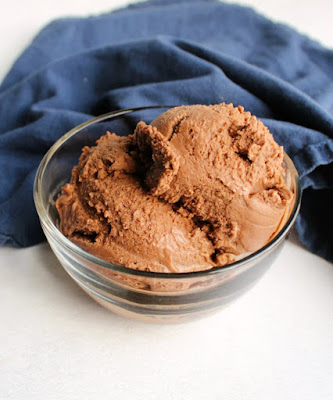 Peanut butter, chocolate and bananas come together to make this dairy free, gluten free, guilt free nice cream treat! It takes almost no effort to make and tastes like a dream! small glass bowl full of chocolate peanut butter nice cream