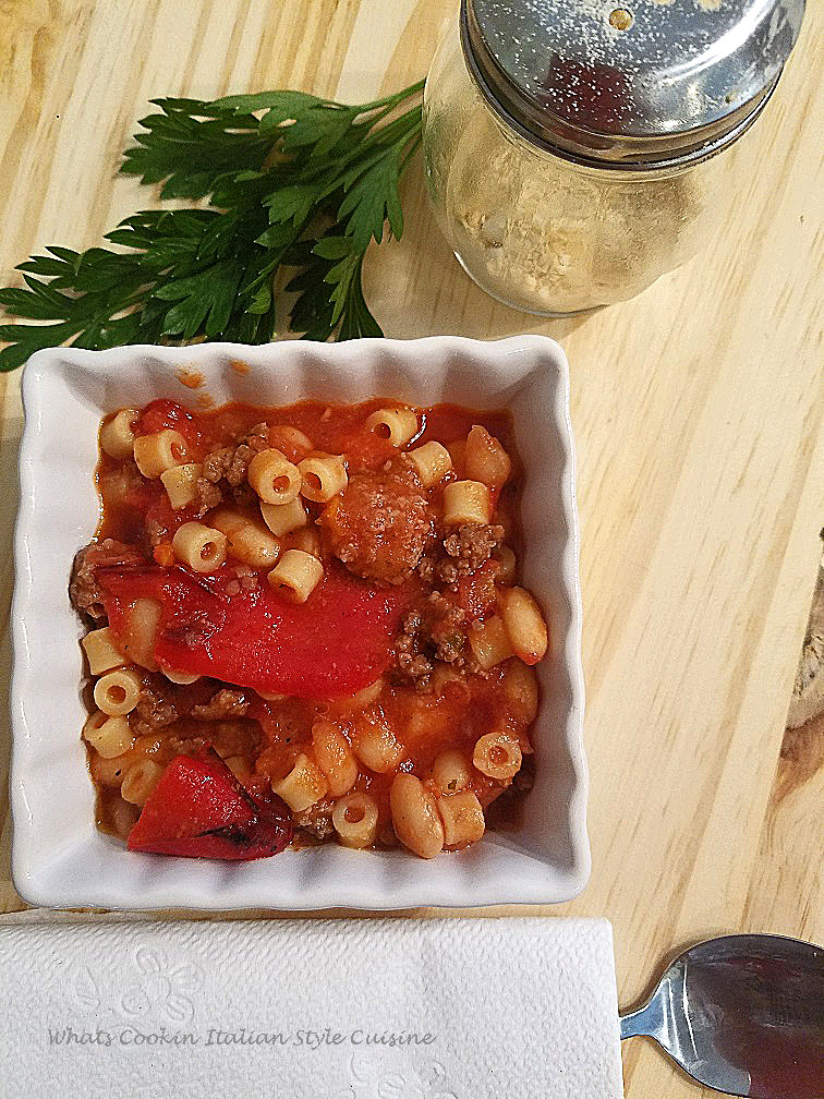 this is Italian Goulash in a white square dish with grated cheese and parsley