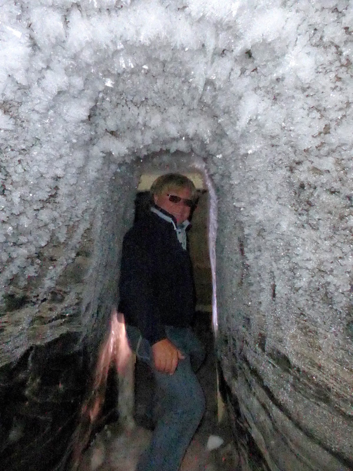 Anders has to  walk sideways to get in and out of the different areas in the ice house.