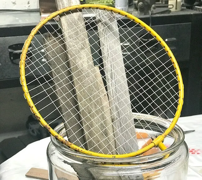 Badminton Racket in a jar