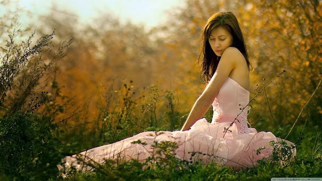 Girl in Graden in Sad mood