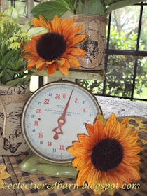 Eclectic Red Barn:Fall centerpiece with burlap wrapped containers. Share NOW. #fallcenterpiece #falldecor #burlap #eclecticredbarn