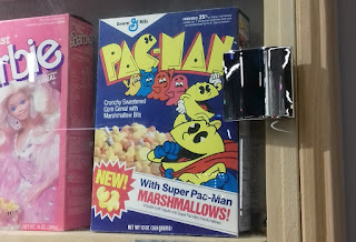 Back in the 1980's you could get Pac-Man breakfast cereal. I saw this old box at the Cereal Killer Cafe in Birmingham
