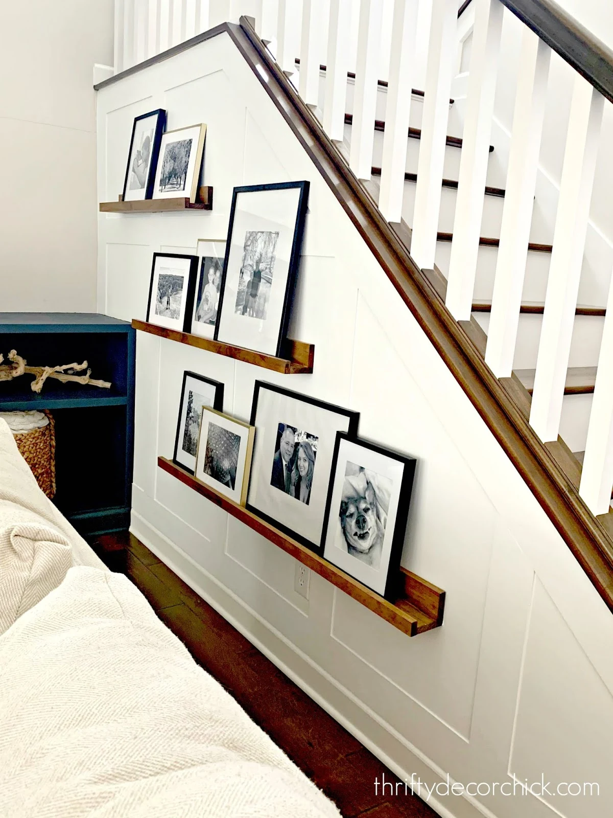 White accent board and batten wall stairs 