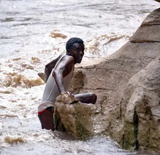 Okob at the riverbank