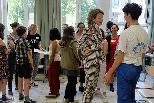 Queen Mathilde of Belgium visited the Maria Boodschap Lyceum, a catholic school for secondary education in Brussels for program Conflixers