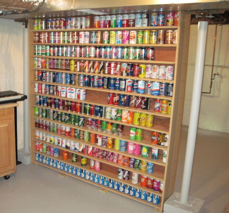 Soda Can Collection Stocking the First Set of Shelves