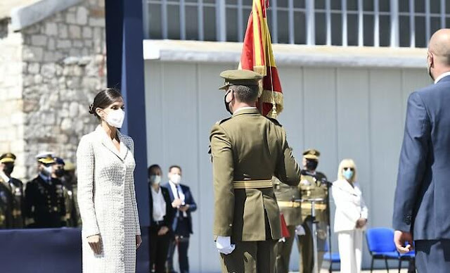 Queen Letizia wore a dress by Felipe Varela for baptism ceremony of Princess Leonor. Carolina Herrera authentic handbag