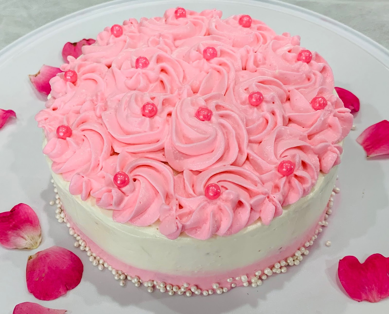 The Sizzling Pan Dark Chocolate Cake with NeonPink Whipped Cream Frosting