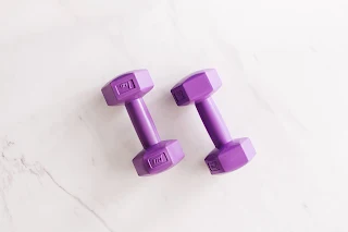 purple cast dumbbells for body fitness