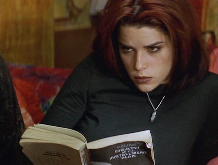 Neve Campbell as Suzie Marie Toller. 