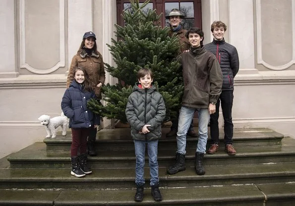 Princess Marie wore  a fur trim utility jacket from Barbour. Princess Athena wore a navy blue puffer piping jacket from Zara