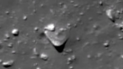 A Disk on Mars with a dome on it's top but in the centre.