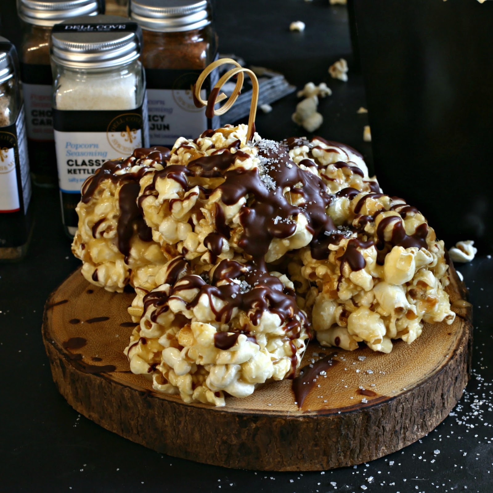 Sweet popcorn balls drizzled with chocolate.