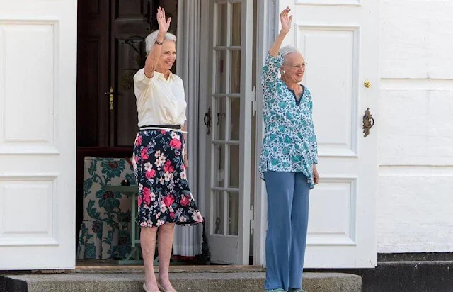 Princess Benedikte wore a floral print skirt and silk top. This Friday's changing of the guards was attended by the Queen and Princess Benedikte