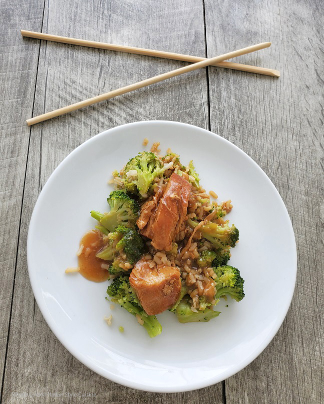 Slow Cooker Asian Chicken with Broccoli and Rice this is rice, broccoli and chicken asian style with chopsticks