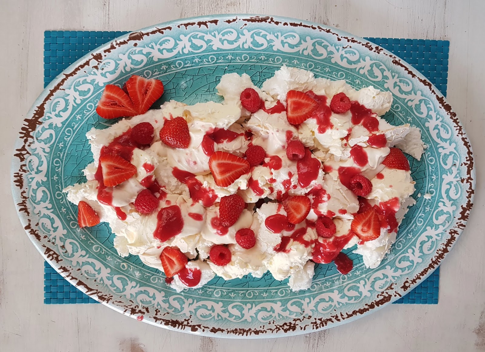 Smashed Pavlova with Raspberry Coulis Cream