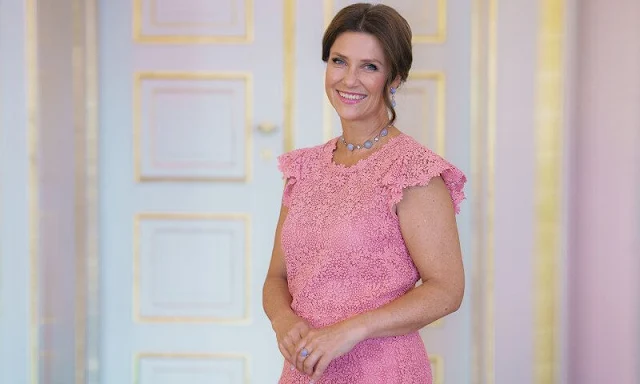 Princess Martha Louise wore a pink lace dress by Valentino. Emilio Pucci blue lace blouse. Crown Princess Mette-Marit wore the same dress