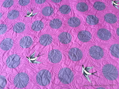 'Free Fall' Tula Pink extra wide fabric with Nemesh Feathers quilting pattern