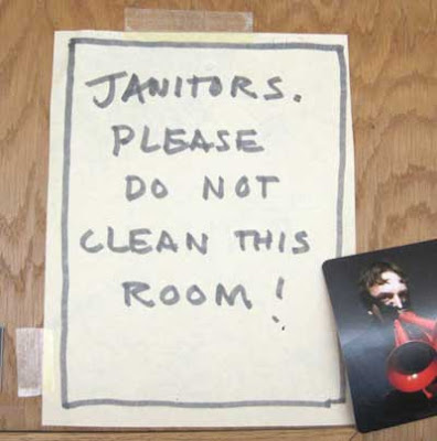 Handwritten sign reading Janitors - please do not clean this room