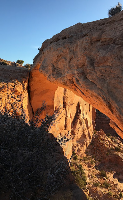 Mesa Arch glowing in the sunrise