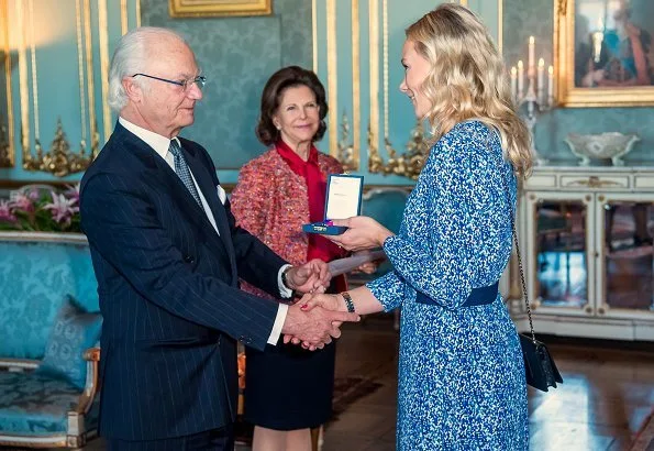 Queen Silvia attended the medal ceremony at Royal Palace