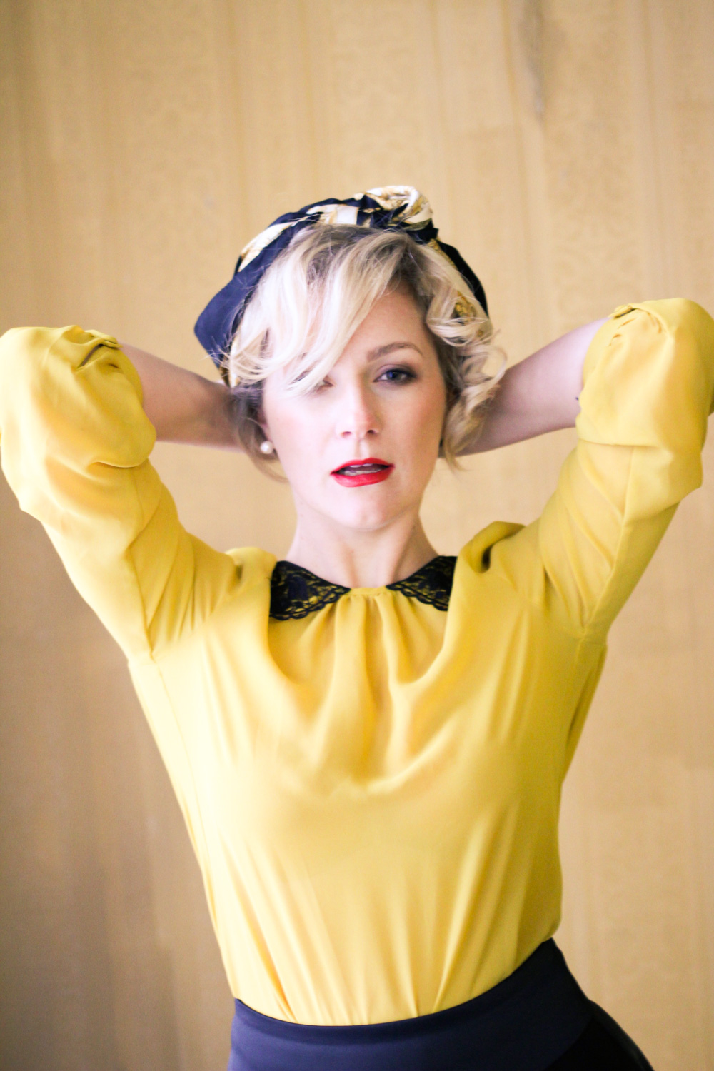 @findingfemme in yellow blouse with black lace collar, black Review Australia skirt, black bow heels and classic scarf.