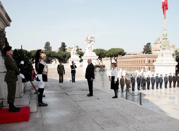 King Harald and Queen Sonja of Norway leave a wreath at the Altare della Patria (Altar of the Fatherland -Tomb of the Unknown Soldier)diamond earrings, summer fashions