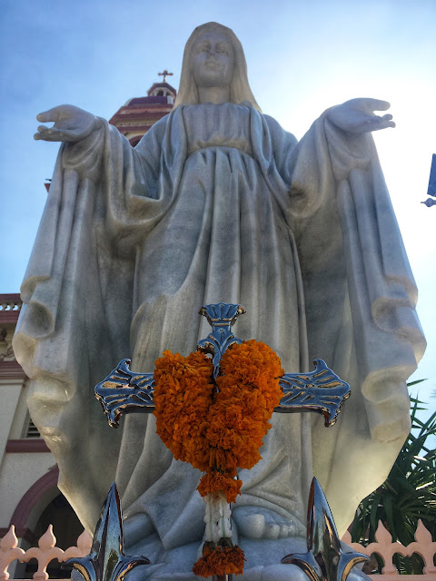 a statue of the Virgin Mary outside of Santa Cruz Church in Tonburi (Bangkok), Thailand