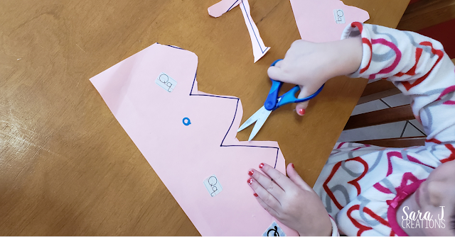 Making and cutting a crown for fine motor practice all about queens and the letter Q