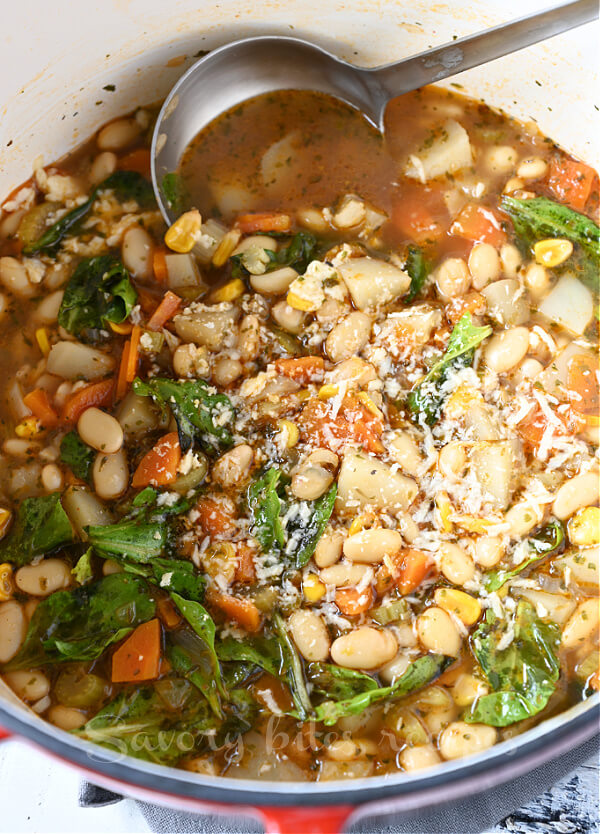 a dutch oven with delicious white bean vegetable soup