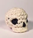 http://translate.google.es/translate?hl=es&sl=en&u=http://www.louiesloops.com/2014/10/how-to-crochet-skull.html&prev=search