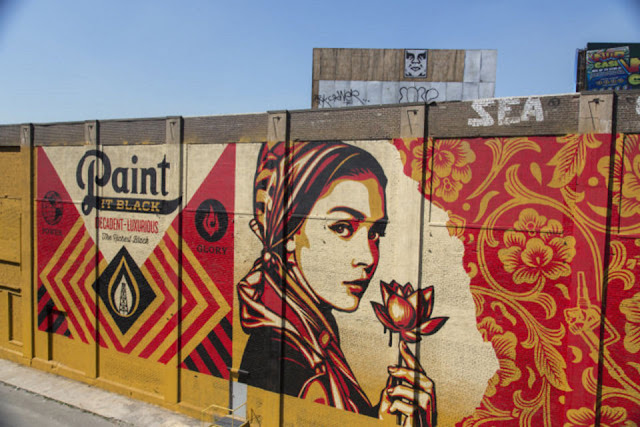 Shepard Fairey and his crew just finished working on a 147-feet long and 47-feet high mural on the streets of Jersey City in the USA.