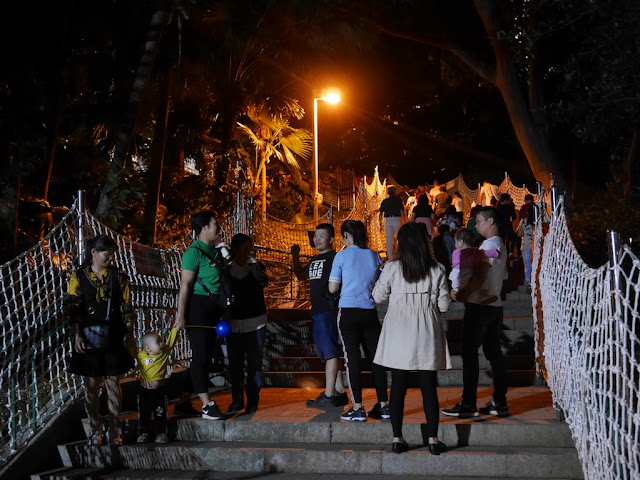 people on stairs at night in Zhongshan Park in Zhongshan