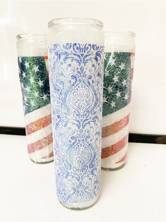 American flag and a blue glittered candle