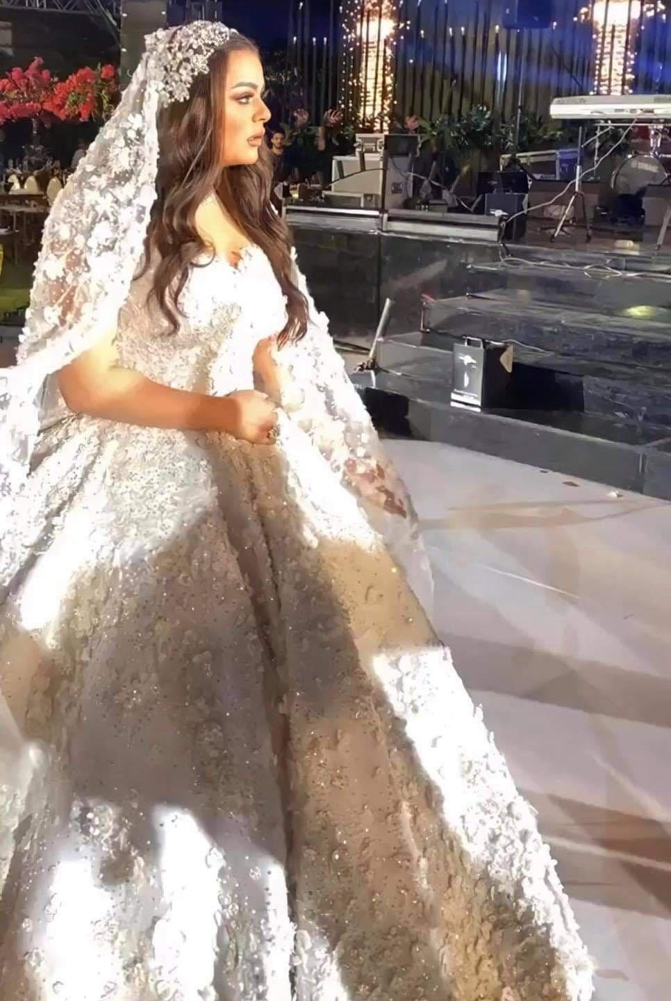 اخر صيحات طرحات فساتين الزواج 02.jpg