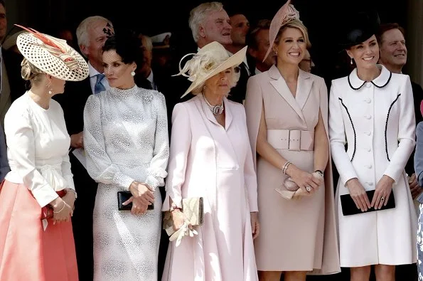 The Duchess is wearing Catherine Walker. Queen Maxima is wearing Claes Iversen. Queen Letizia wore a printed midi dress by Cherubina