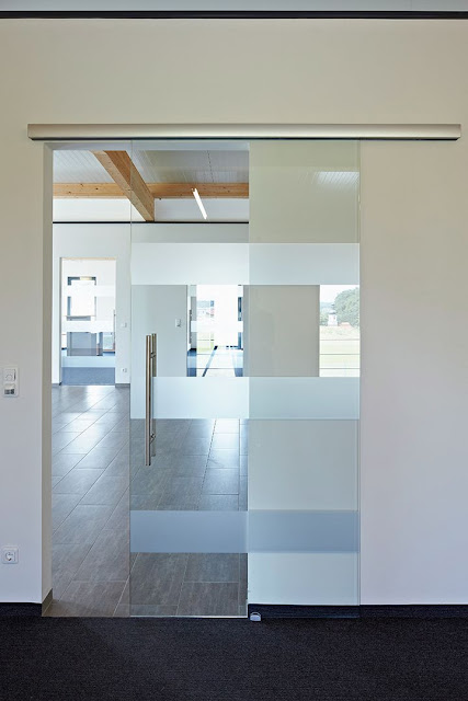 Sliding glass partitions