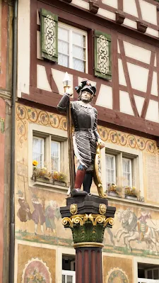Soldier statue atop a fountain in Stein am Rhein on a day trip from Zurich