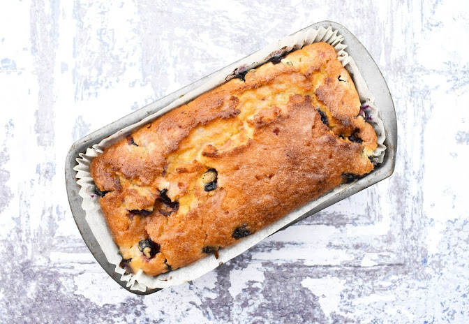 blueberry and lemon cake in a loaf tin