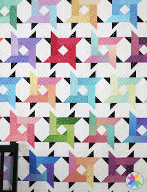 Windy City quilt pattern by Andy of A Bright Corner - these star blocks are so fun and the pattern comes in four sizes
