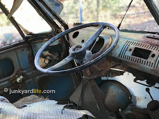 Behind the wheel look at the 1965 VW Kombi. One side of Safari glass came loose from frame (but still intact) during transport.