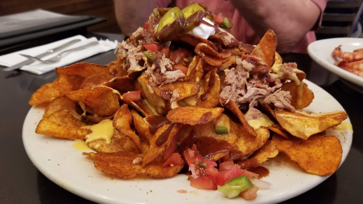 Loaded chips with pulled pork, pico de gallo, and jalapenos, at Doc Crows, Louisville