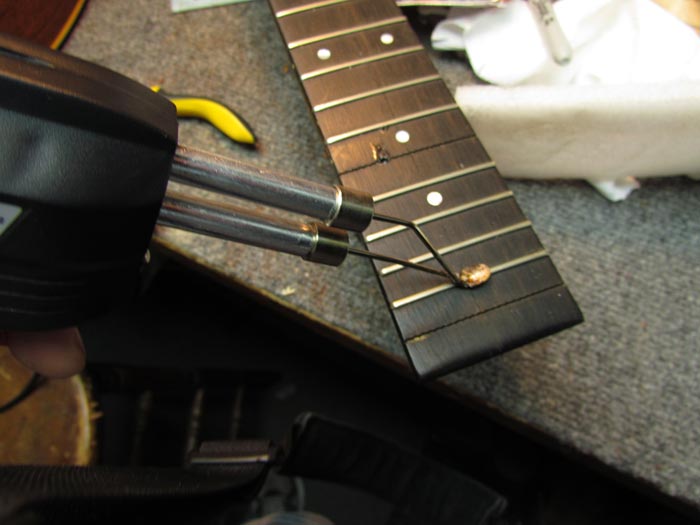 Fret Removal on the Martin Guitar Fingerboard Crawls Backward (When