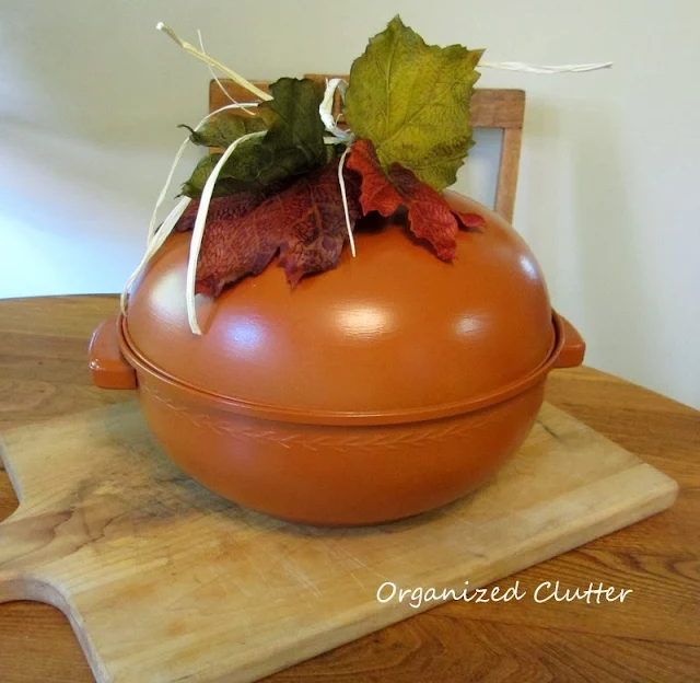 Repurposing a vintage bun warmer into a pumpkin http://organizedclutterqueen.blogspot.com/2013/10/vintage-bun-warmer-re-purposed-as.html