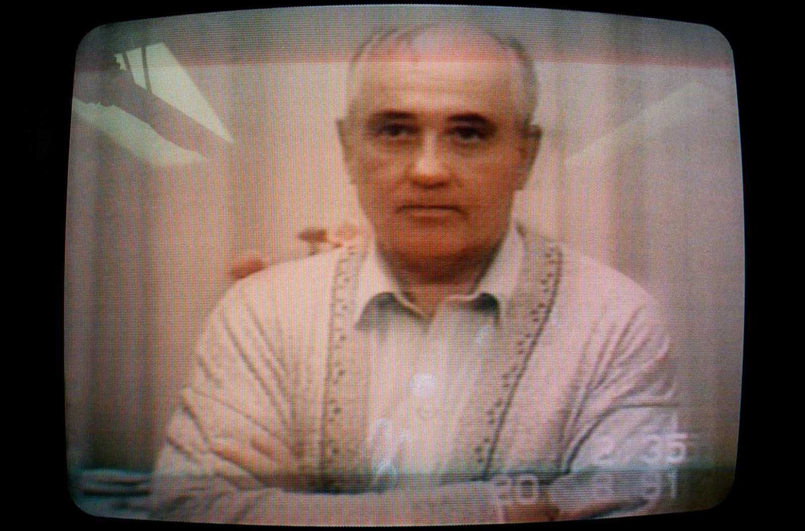 A picture shows Soviet President Mikhail Gorbachev speaking in a video message taped on August 19, 1991, the second day of his captivity. Gorbachev said there had been an unconstitutional coup and that he was completely well. Photo taken on August 25, 1991.